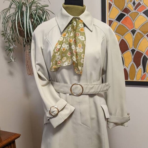 Vintage 1970s Beige Princess Seam Polyester Coat with Gold Buckle Sleeves and Matching Belt by "Alvin's"