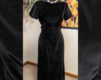 Vintage Late 1950s Black Velvet Boat Neck Elegant Midi Wiggle Sheath Dress with Bow Detail