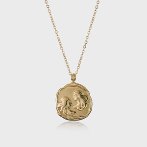 Gemini Zodiac Sign Necklace Featuring a Gold Pendant of The Twins Symbol