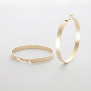 Less wide hoop earring