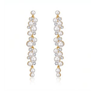 May include: A pair of elegant gold-toned earrings. Each earring features a cascading design of white faux pearls and sparkling clear crystals. The earrings are designed to dangle, creating a sophisticated and eye-catching accessory.