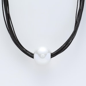 Sophisticated Black Cord Necklace with Chunky Vintage-Inspired Pendant