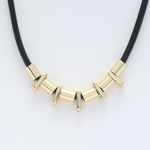 Elegant Gold Pendants on Black Cord Necklace for Timeless Luxury