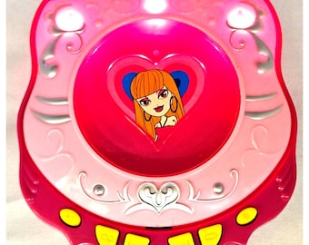 Reproductor de CD Bratz de juguete MGA Entertainment, año 2002, de 5" x 6"