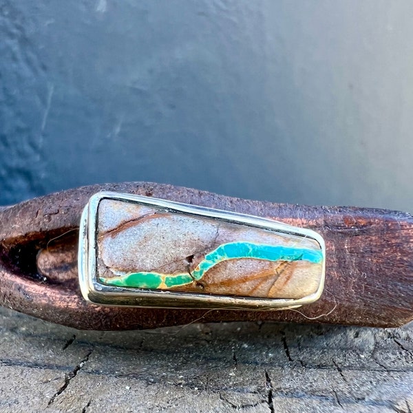 Royston Ribbon Green Turquoise, Natural Stone, Sterling Silver Button, on a  Distressed leather band. Size 6 3/4” wrist