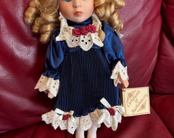 Soft expressions vintage porcelain doll with tag