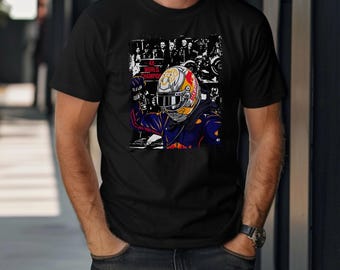 May include: Black t-shirt featuring a graphic of a race car driver in a helmet, celebrating a victory. The design includes the text "4X WORLD CHAMPION" and a crowd in the background. The driver is wearing a helmet with red, yellow, and white accents.