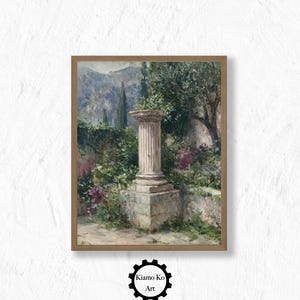 May include: A framed art print depicting a classical garden scene. The artwork shows a stone column in a verdant garden with mountains in the background. The colour palette includes greens, blues, and earth tones. The artwork is from Kiamo Ko Art.
