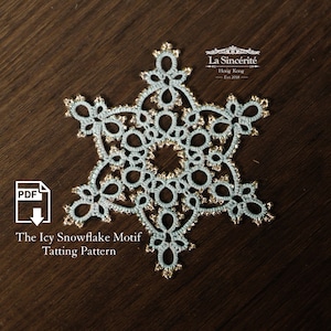 May include: A delicate, light blue snowflake tatting pattern with gold beads. The pattern is called "The Icy Snowflake Motif" and is a downloadable PDF.