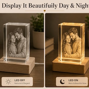 May include: A rectangular crystal block featuring a 3D laser-engraved image of a couple, mounted on a light-colored wooden base. The display shows two states: LED OFF with a clear appearance and LED ON with a warm, illuminated golden glow.