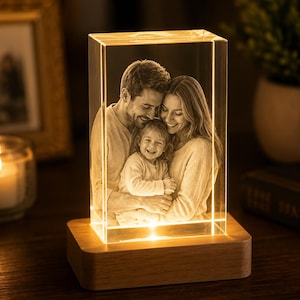 Personalized 3D crystal photo keepsake with warm LED light base featuring a custom laser engraved family portrait. Handmade memorial crystal gift for parents, anniversary, wedding, family, birthday, Christmas, and home decor. Premium optical crystal with optional personalized wooden LED display base.