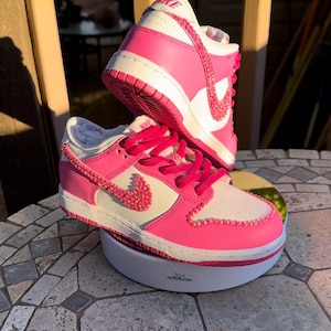 Pink sparkly nikes best sale