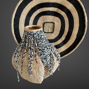 Garlic Gourd Beaded 12inch, Beaded Basket, Woven Basket, African Decor, Home Decor, Binga Basket, African Basket, Woven Basket, Beaded Basket.  Elevate your living space with this exquisite, one-of-a-kind Beaded Garlic Gourd Basket. Beautifully merging functionality with intricate artistry, this handwoven piece adds a touch of earthy, bohemian charm to any room.