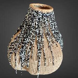 Garlic Gourd Beaded 12inch, Beaded Basket, Woven Basket, African Decor, Home Decor, Binga Basket, African Basket, Woven Basket, Beaded Basket.  Elevate your living space with this exquisite, one-of-a-kind Beaded Garlic Gourd Basket. Beautifully merging functionality with intricate artistry, this handwoven piece adds a touch of earthy, bohemian charm to any room.