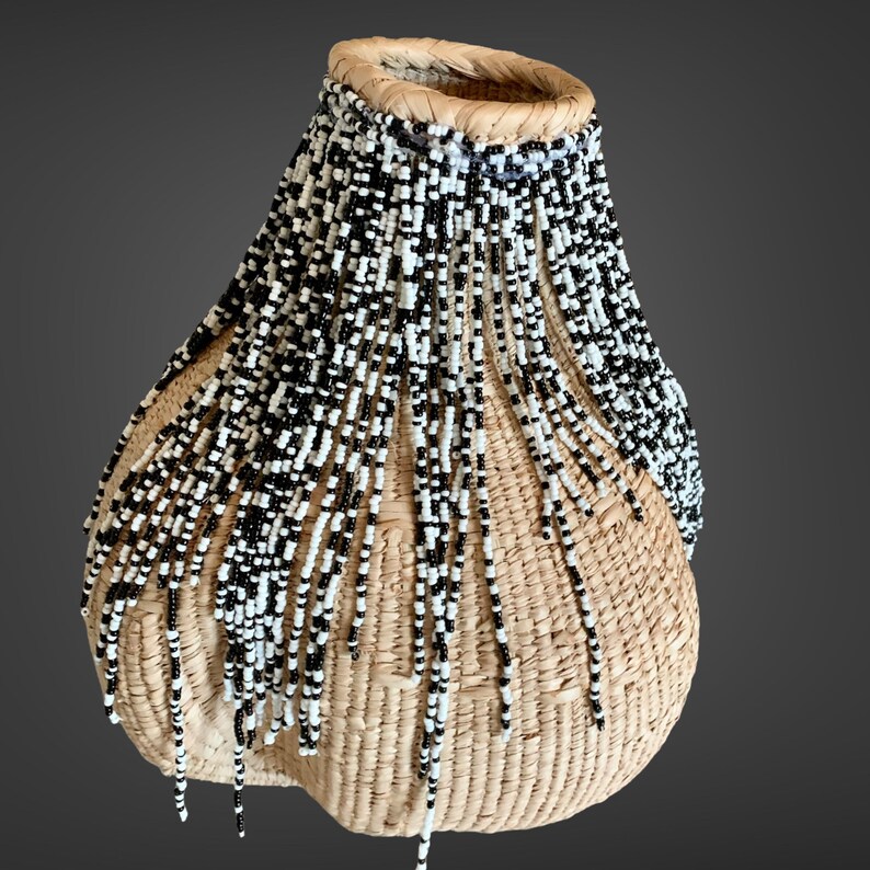 Garlic Gourd Beaded 12inch, Beaded Basket, Woven Basket, African Decor, Home Decor, Binga Basket, African Basket, Woven Basket, Beaded Basket.  Elevate your living space with this exquisite, one-of-a-kind Beaded Garlic Gourd Basket. Beautifully merging functionality with intricate artistry, this handwoven piece adds a touch of earthy, bohemian charm to any room.