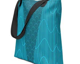 May include: A turquoise tote bag with black straps. The bag features a geometric pattern of wavy lines and circles.