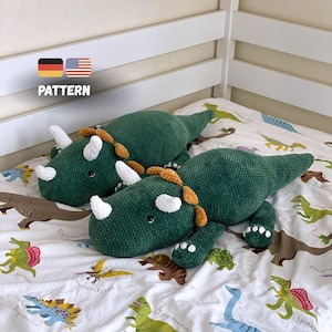 Wzór szydełkowy na dinozaura. Wzór amigurumi. Pluszowe zabawki szydełkowe. Dinozaur amigurumi. Zwierzęta szydełkowe. Pluszowy wypchany dinozaur. Zabawka DIY dla dzieci