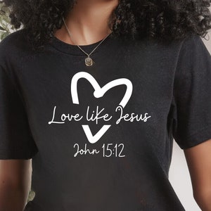 May include: Black t-shirt with a white heart and the text "Love like Jesus John 15:12"