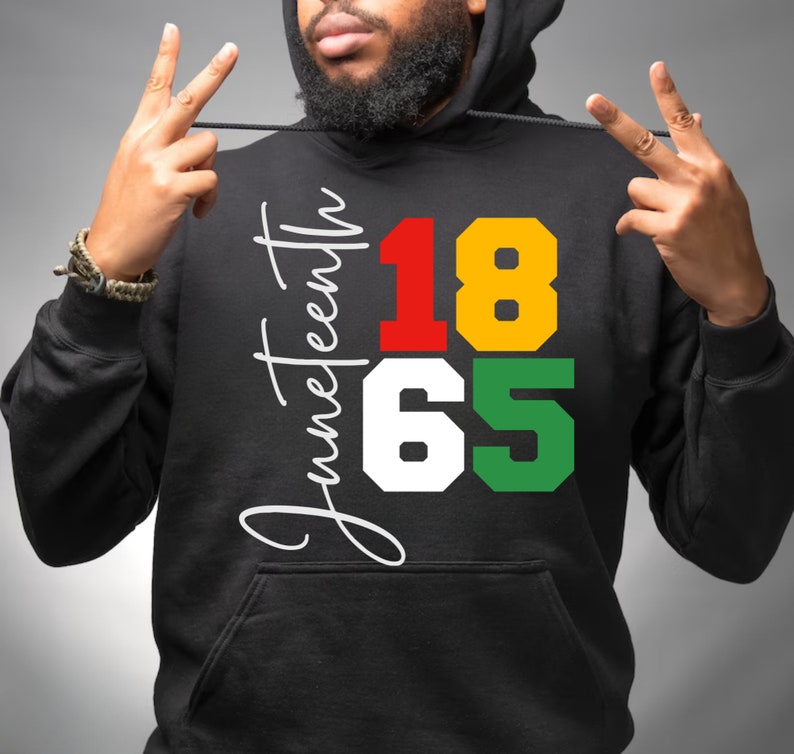 May include: Black hooded sweatshirt with the text "Juneteenth 1865" in white, red, yellow, and green.