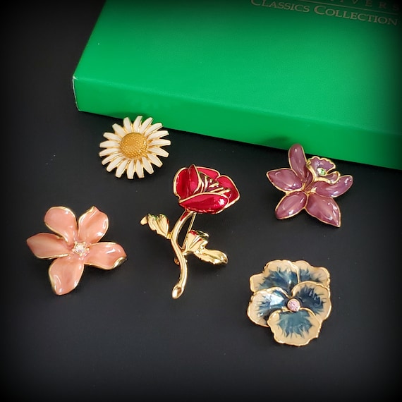 Joan rivers flower brooch deals