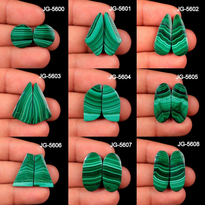 May include: A collection of malachite gemstone pairs in various shapes, including round, teardrop, and oval. Each pair displays a vibrant green color with distinctive banded patterns. The gemstones are presented against a dark background, highlighting their natural beauty.