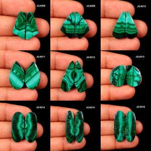May include: A collection of nine pairs of polished malachite gemstones, each with unique patterns of dark green and light green swirls and bands. The gemstones are displayed against a dark background, showcasing their natural beauty and variations in shape.