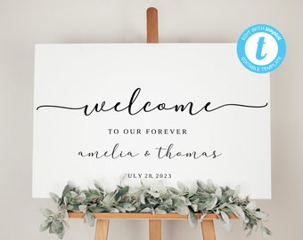 May include: White welcome sign with black calligraphy text that reads "welcome to our forever amelia & thomas july 28, 2023".