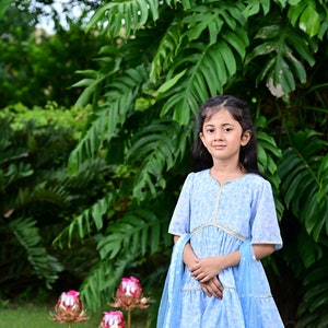 Girls ready to wear embellished gathered kurta comes with a flared bottom