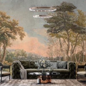 May include: A living room scene featuring a large mural of a landscape with trees and a sunset. A dark green tufted sofa, two armchairs, and a coffee table are in front of the mural. The room is decorated with a rug and a chandelier.