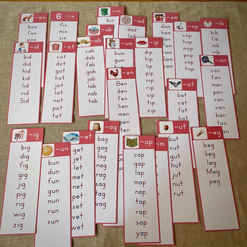 May include: A set of colourful flashcards with various letter combinations and illustrations. The cards are organised by sound and feature a variety of images, including animals, objects, and letters. The cards are designed to help children learn phonics and improve their reading skills.