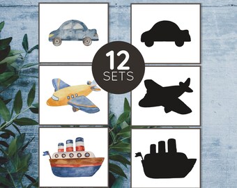 May include: A set of 12 shadow matching cards featuring transportation vehicles. The cards include a blue car, a yellow airplane, and a red, white, and blue boat. Each vehicle has a corresponding shadow card.