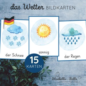May include: A set of weather flashcards with watercolor illustrations. The cards feature images of snow, sun, and rain, with German text. A German flag is included on one card. The set includes 15 cards.