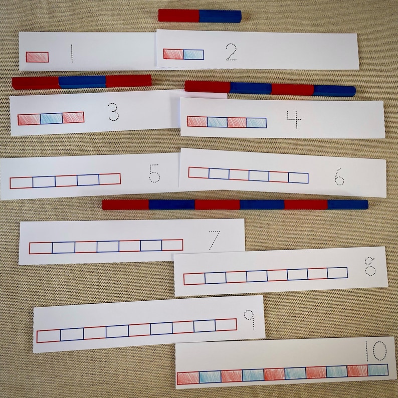 May include: A set of ten printable number cards with red and blue squares to help children learn to count. The cards are numbered 1 through 10 and have a corresponding number of squares on each card.
