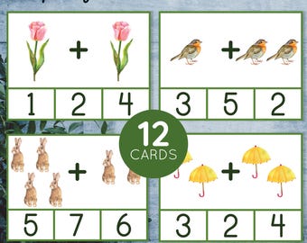 May include: Twelve spring-themed addition clip cards for kids. Each card features a colorful illustration of a tulip, robin, bunny, or umbrella. The cards include numbers 1 through 7 to help children learn addition.