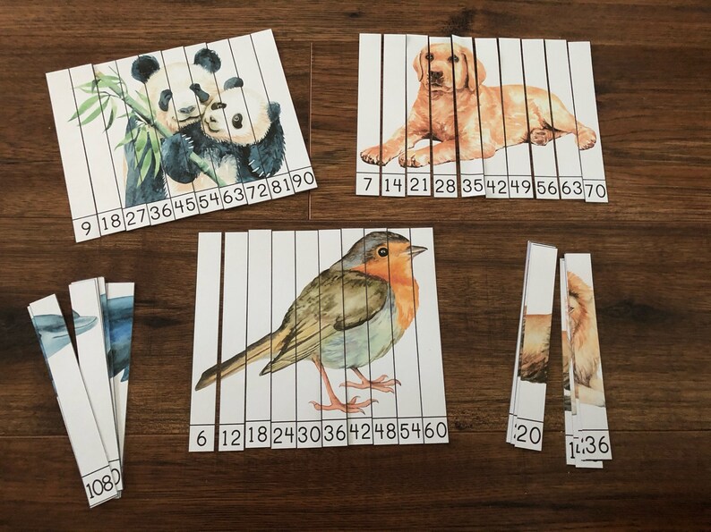 May include: A set of 10 printable puzzle strips featuring watercolor illustrations of animals. The animals include a panda, a dog, a robin, and a lion. Each strip has numbers printed on it, indicating the order in which the strips should be assembled.