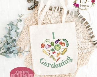 Op de afbeelding: Een witte tote bag met een groen hartontwerp met verschillende groenten en de tekst "Ik hou van tuinieren".