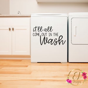 May include: White washing machine with a black vinyl decal that reads "It'll all come out in the wash".