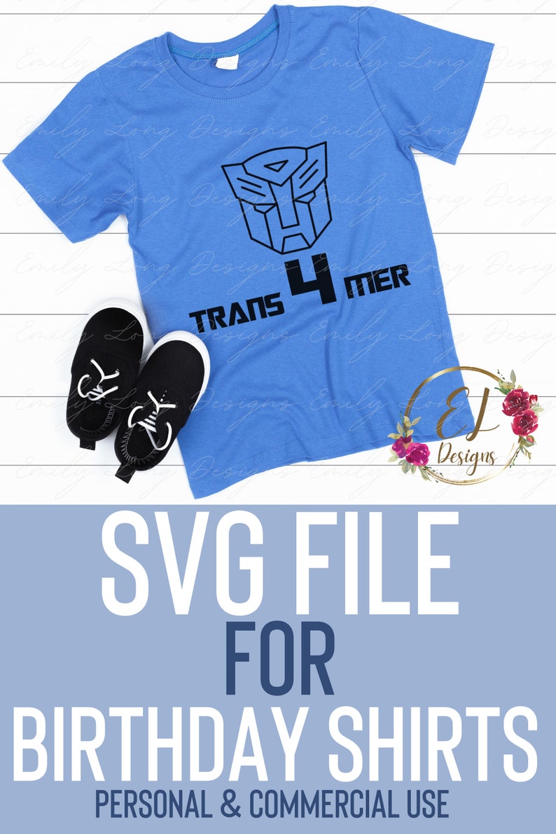 May include: A blue t-shirt with a black Transformers logo and the text "TRANS 4 MER" on it. The shirt is on a white wooden surface with a pair of black shoes.
