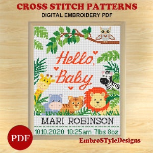 May include: Cross stitch pattern PDF for a baby announcement with a jungle theme. The pattern features a giraffe, zebra, lion, tiger, hippopotamus, and an owl. The text reads "Hello Baby" with a heart and the name "MARI ROBINSON" with the date and time of birth: 10.10.2020 10:25am 7lbs 8oz. The pattern is by EmbroSTyleDesigns.