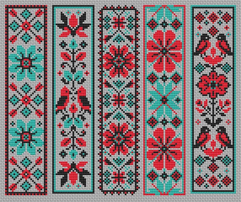 May include: Five embroidered bookmarks with a gray background. Each bookmark features a different design in red, black, and teal. The designs include floral patterns, geometric shapes, and bird motifs. The bookmarks are rectangular and have a border.