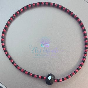 Ilde / Bracelet of Eleggua with Small (2mm) Solid Black & Shiny Red Seed Beads with a Black Rondelle Czech Crystal Bead With a Tie Closure