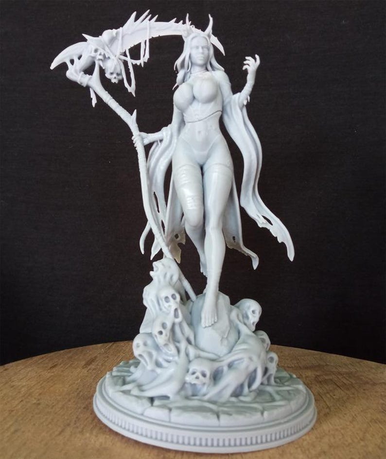 May include: A gray, detailed, 3D printed figurine of a female figure with a skeletal scythe, standing on a base with skulls and ghostly figures.