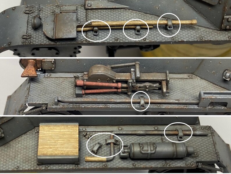 Puede incluir: Primer plano de un tanque modelo con varias herramientas y equipos unidos al lateral. Las herramientas incluyen una pala, una varilla de metal y un extintor. El tanque est&aacute; pintado de color gris oscuro.