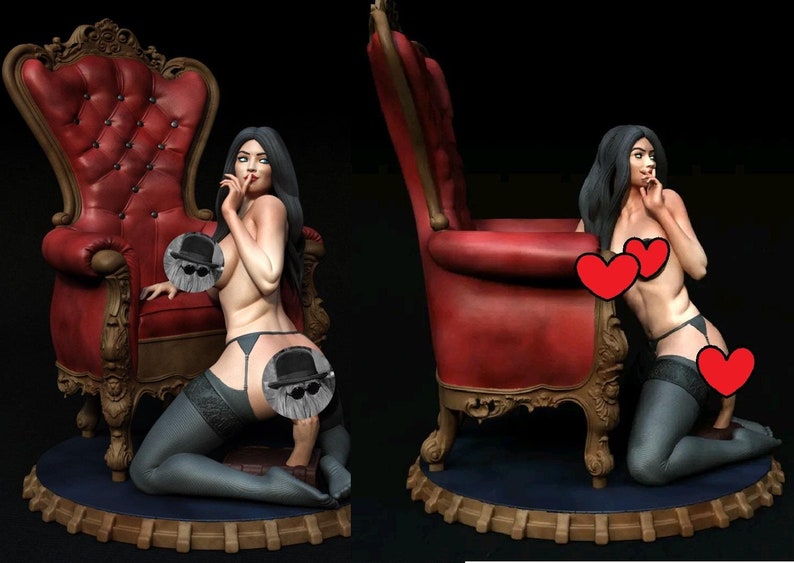 May include: A woman in lingerie poses on a red velvet chair with ornate carvings. She is wearing a black garter belt and stockings. The chair is on a wooden base with a blue velvet cushion.