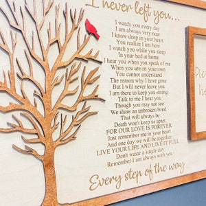 May include: A wooden wall plaque featuring a laser-cut tree with a red cardinal bird, engraved with the poem I never left you, and a rectangular frame for a photograph. The text includes the phrases For our love is forever and Every step of the way.