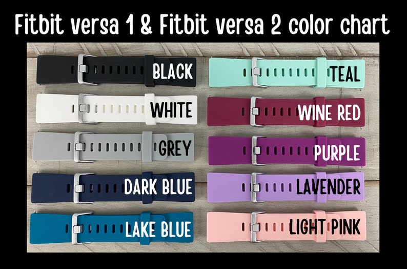 May include: Color chart for Fitbit Versa 1 & 2 watch bands. The image displays various colored bands, including black, white, grey, dark blue, lake blue, teal, wine red, purple, lavender, and light pink. Each band has a silver buckle.