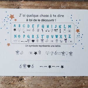Carte symbole à décoder pour découvrir le message tu vas être papa