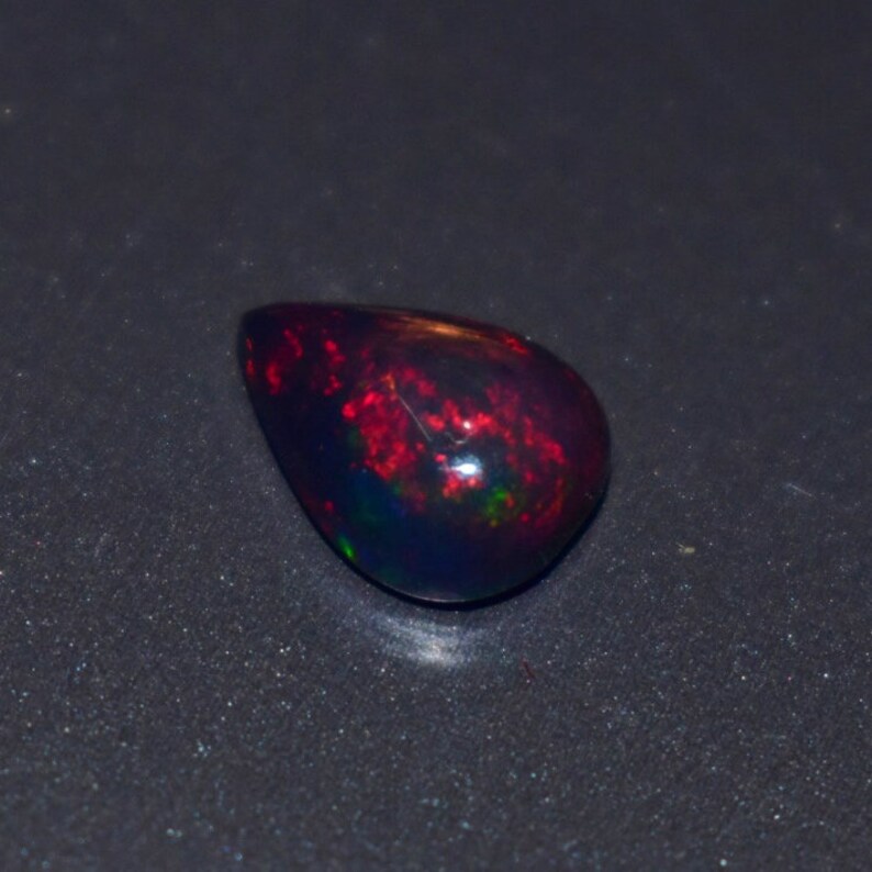 1.35 Cts 7x10 MM Natural Black Ethiopian Opal Cabochon Shape Pear Rainbow Fire Celebrated Opal Welo Fire Smooth Gemstone Opal Cabs Ring