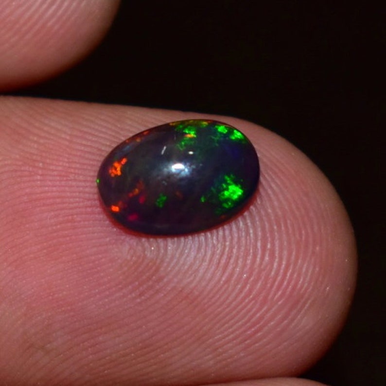 1.35 Cts 7X10 MM Natural Black Ethiopian Opal Cabochon Shape Oval Rainbow Fire Celebrated Opal Welo Fire Smooth Gemstone Opal Cabs Ring