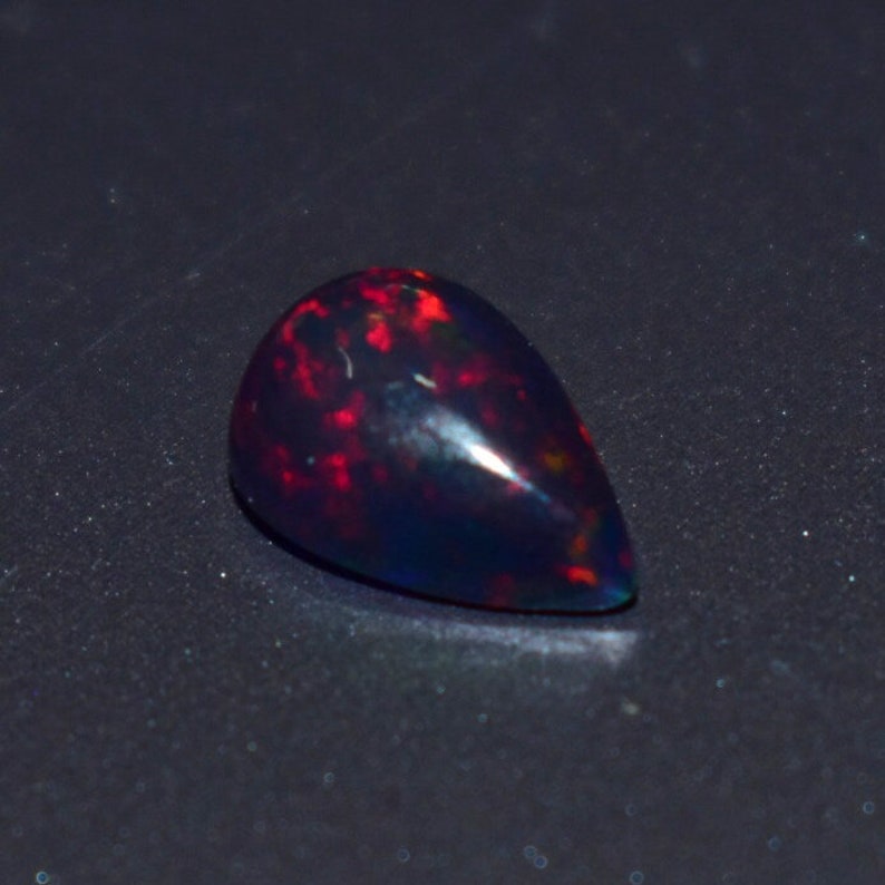 1.35 Cts 7x10 MM Natural Black Ethiopian Opal Cabochon Shape Pear Rainbow Fire Celebrated Opal Welo Fire Smooth Gemstone Opal Cabs Ring